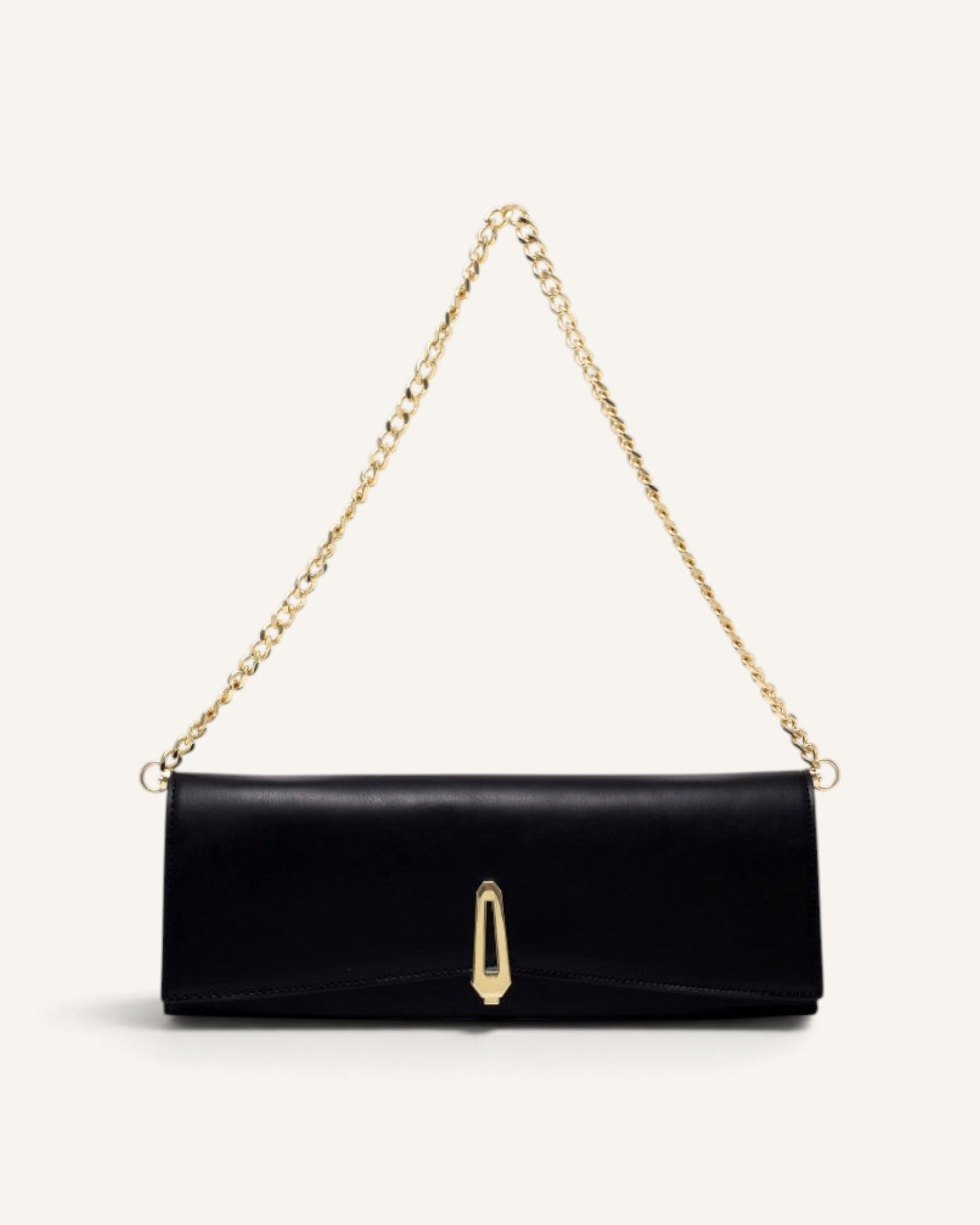 Lunéra de Paris black minimalist baguette shoulder bag with a polished gold chain strap and vertical metal lock