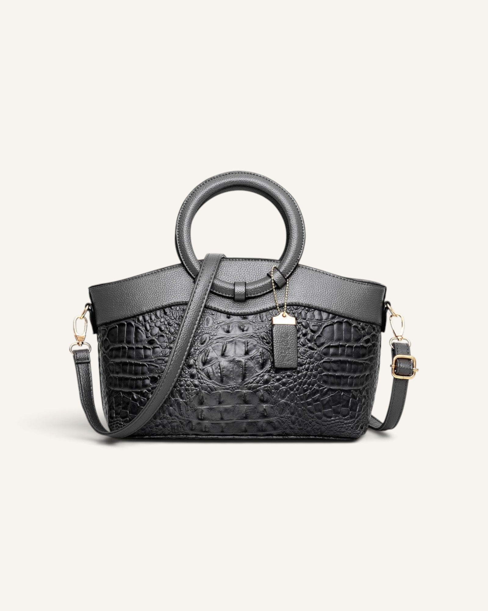 Lunéra de Paris black dual-texture satchel with pebbled upper and crocodile-embossed lower body and gold hardware.