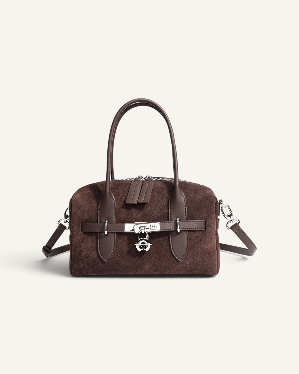 Lunéra de Paris brown suede satchel with a structured horizontal silhouette and silver lock-clasp closure.
