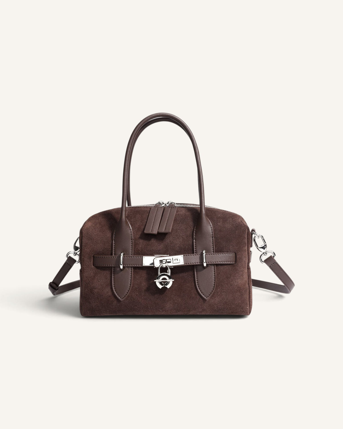 Lunéra de Paris brown suede satchel with a structured horizontal silhouette and silver lock-clasp closure.