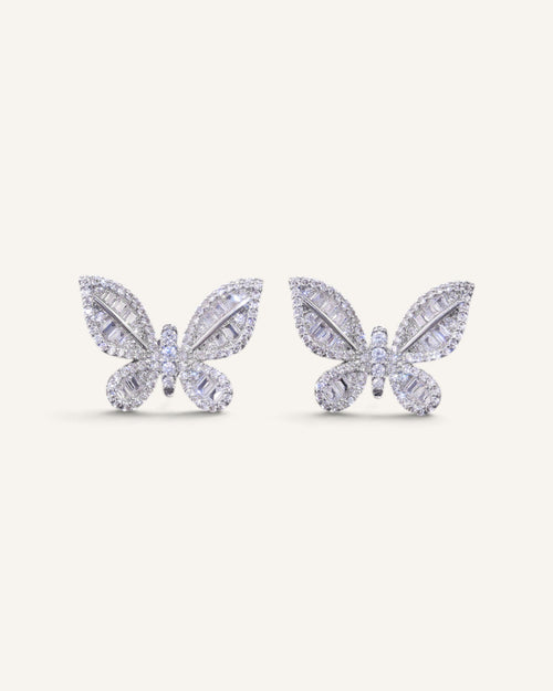 Lunéra de Paris butterfly stud earrings in silver-tone with baguette and round-cut zircon stones.