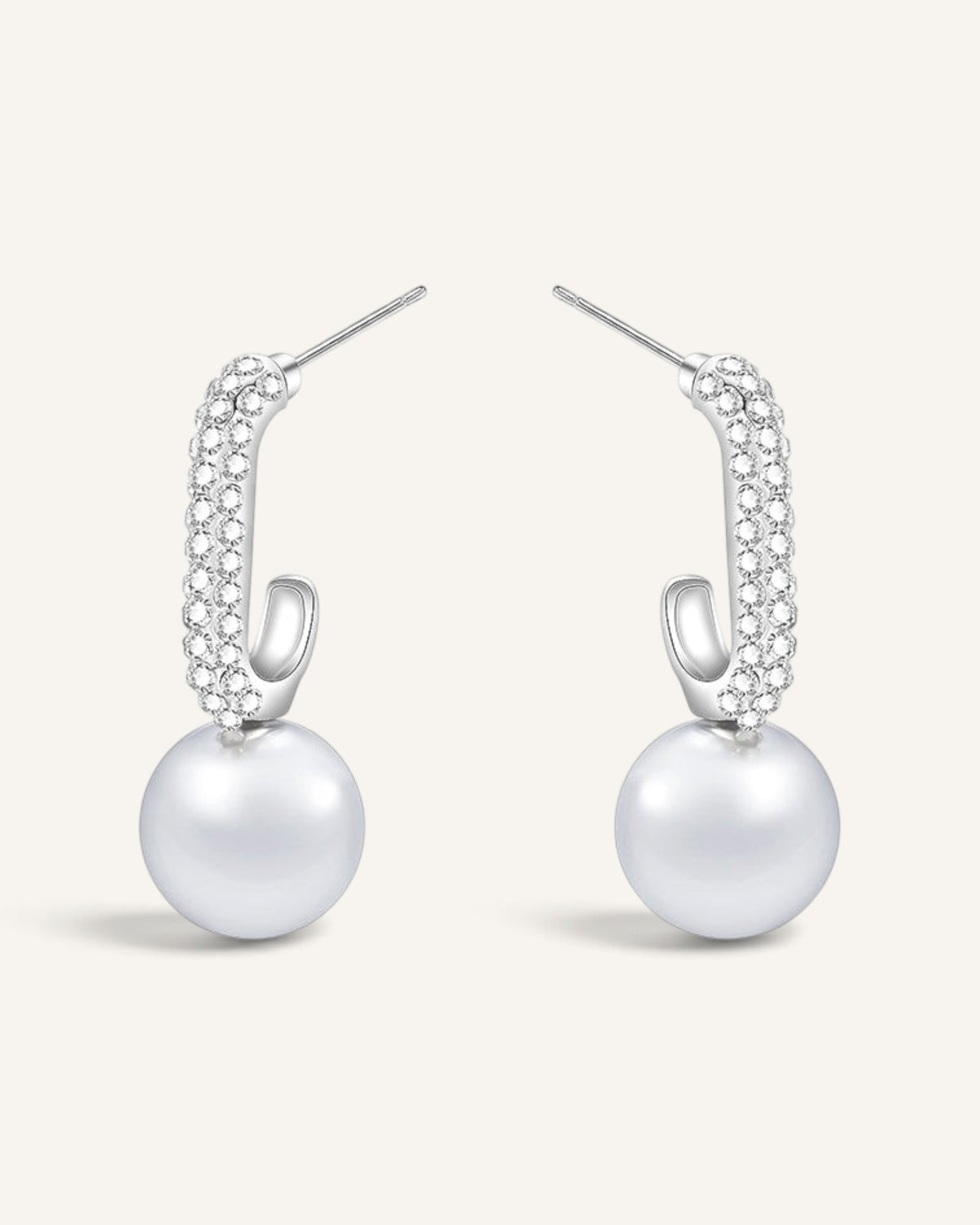 Lunéra de Paris crystal pavé hoop earrings with elegant white pearl drops in a polished silver-tone finish