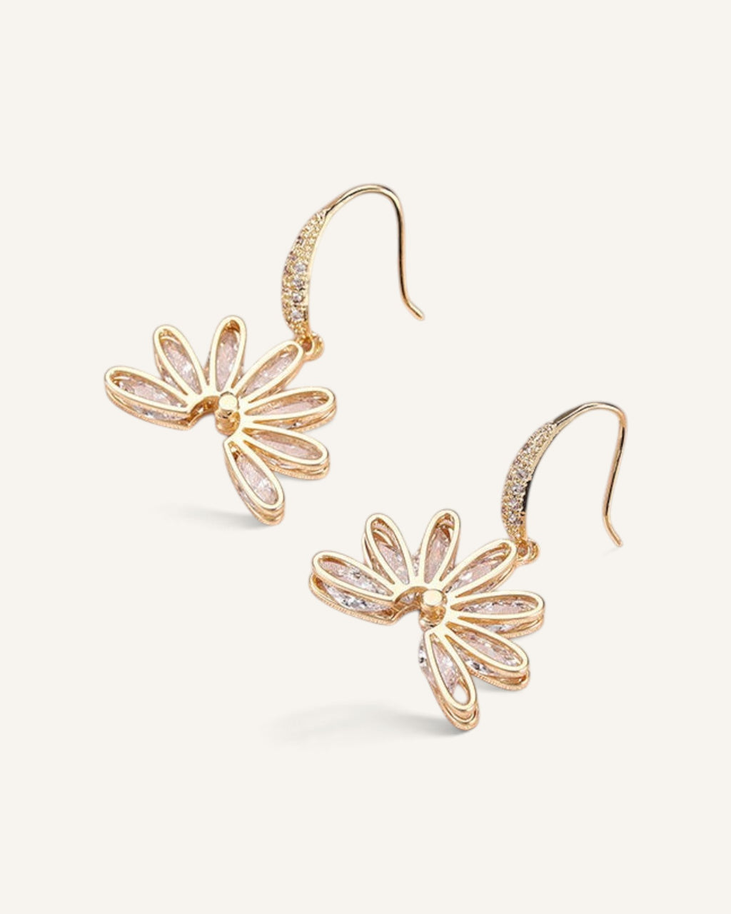 Lunéra de Paris gold tone drop earrings featuring a fan-inspired floral motif with sparkling crystal accents.