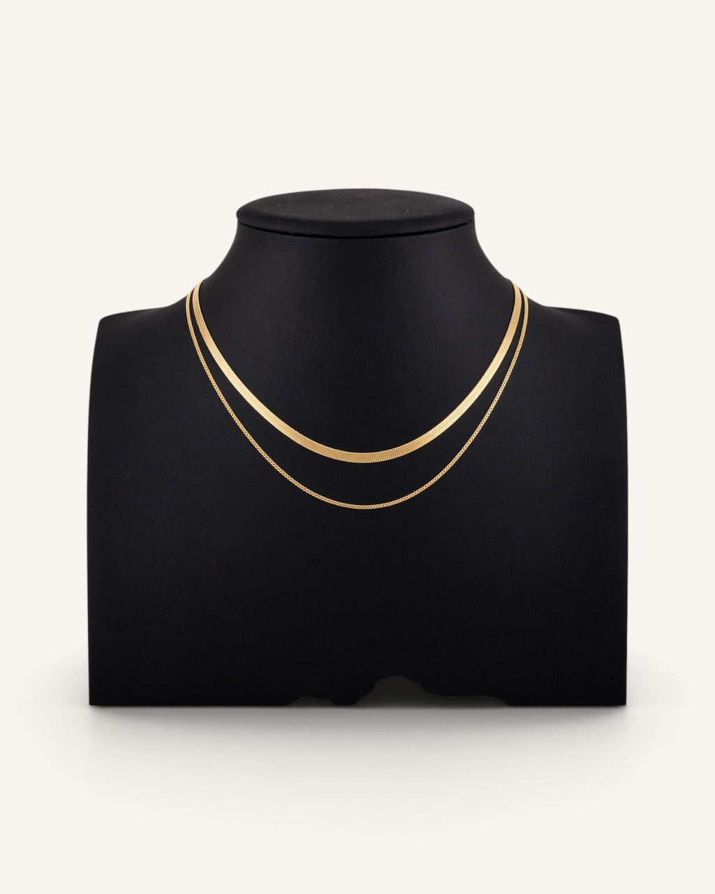 Lunéra de Paris gold plated double-layer necklace featuring a flat herringbone chain and a delicate box chain