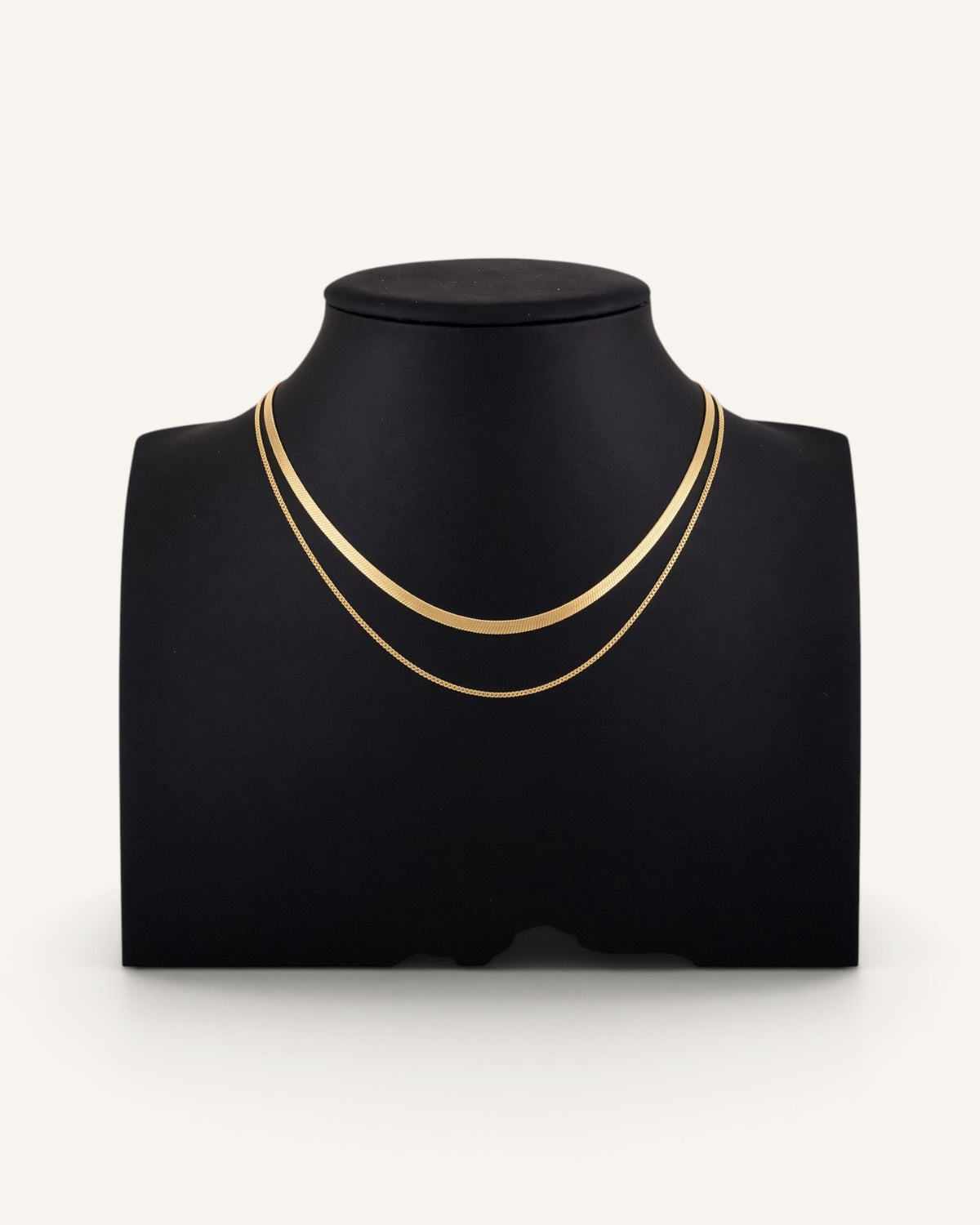 Lunéra de Paris gold plated double-layer necklace featuring a flat herringbone chain and a delicate box chain