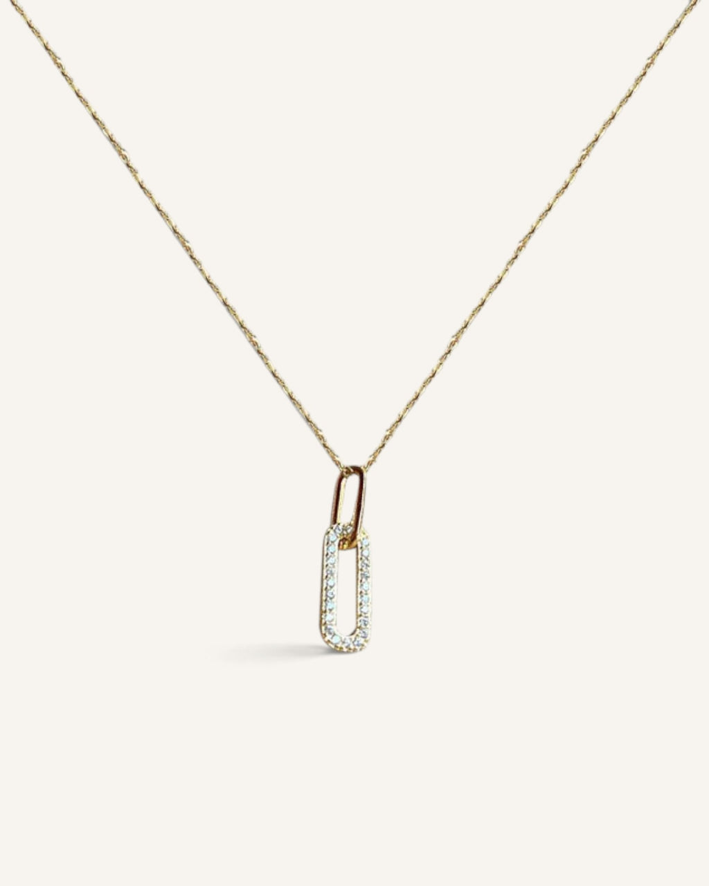 Lunéra de Paris gold geometric pendant necklace with pavé stones on a delicate adjustable chain