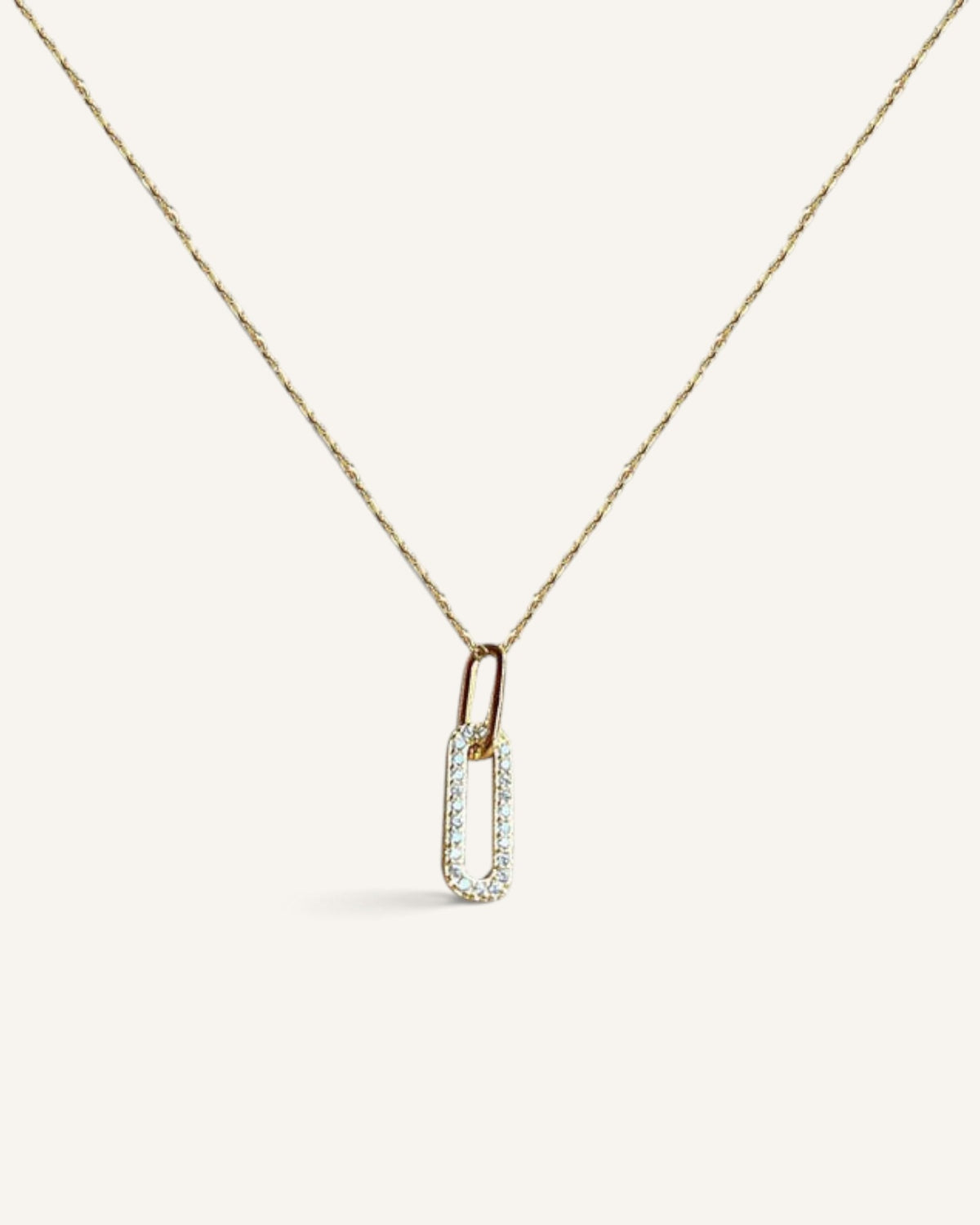Lunéra de Paris gold geometric pendant necklace with pavé stones on a delicate adjustable chain