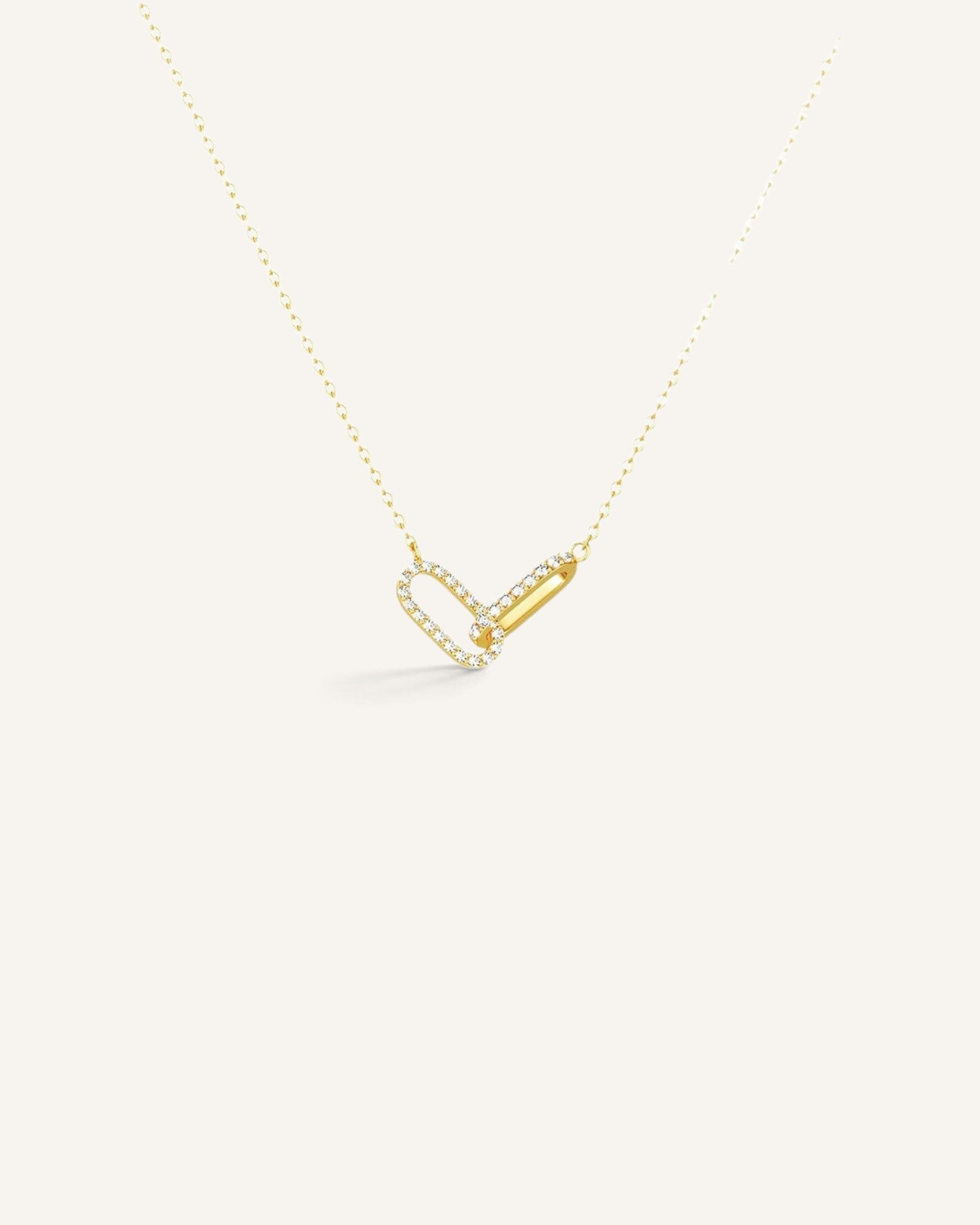 Lunéra de Paris gold interlocking link necklace featuring one pavé zircon link and one polished metal link.