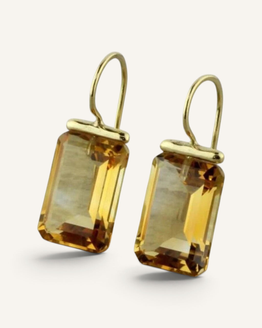 Lunéra de Paris gold-tone rectangular faceted drop earrings with a polished geometric design for modern styling.