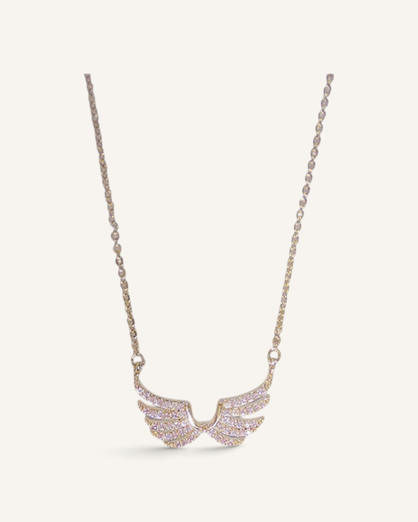 Lunéra de Paris gold-toned double-wing pendant necklace with pave-set sparkling accents on a delicate link chain.