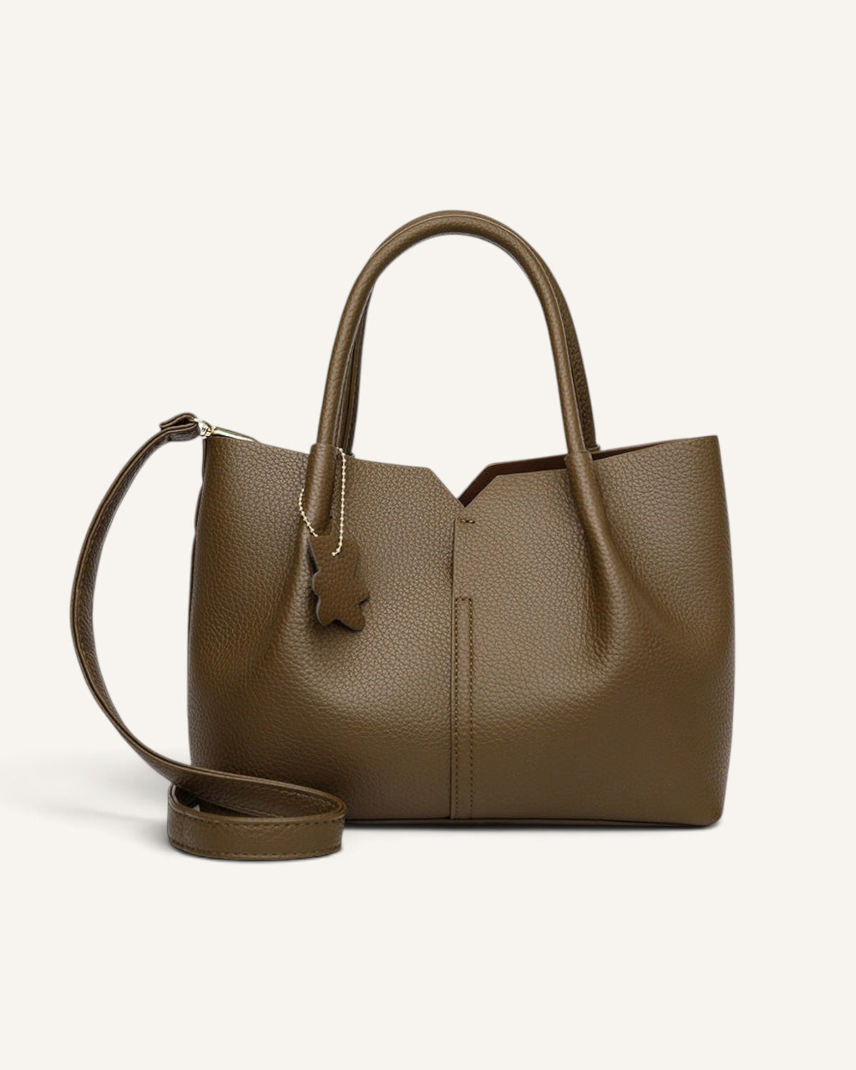 Lunéra de Paris khaki structured tote bag with a V-cut top, dual handles, shoulder strap, and bear-shaped charm.