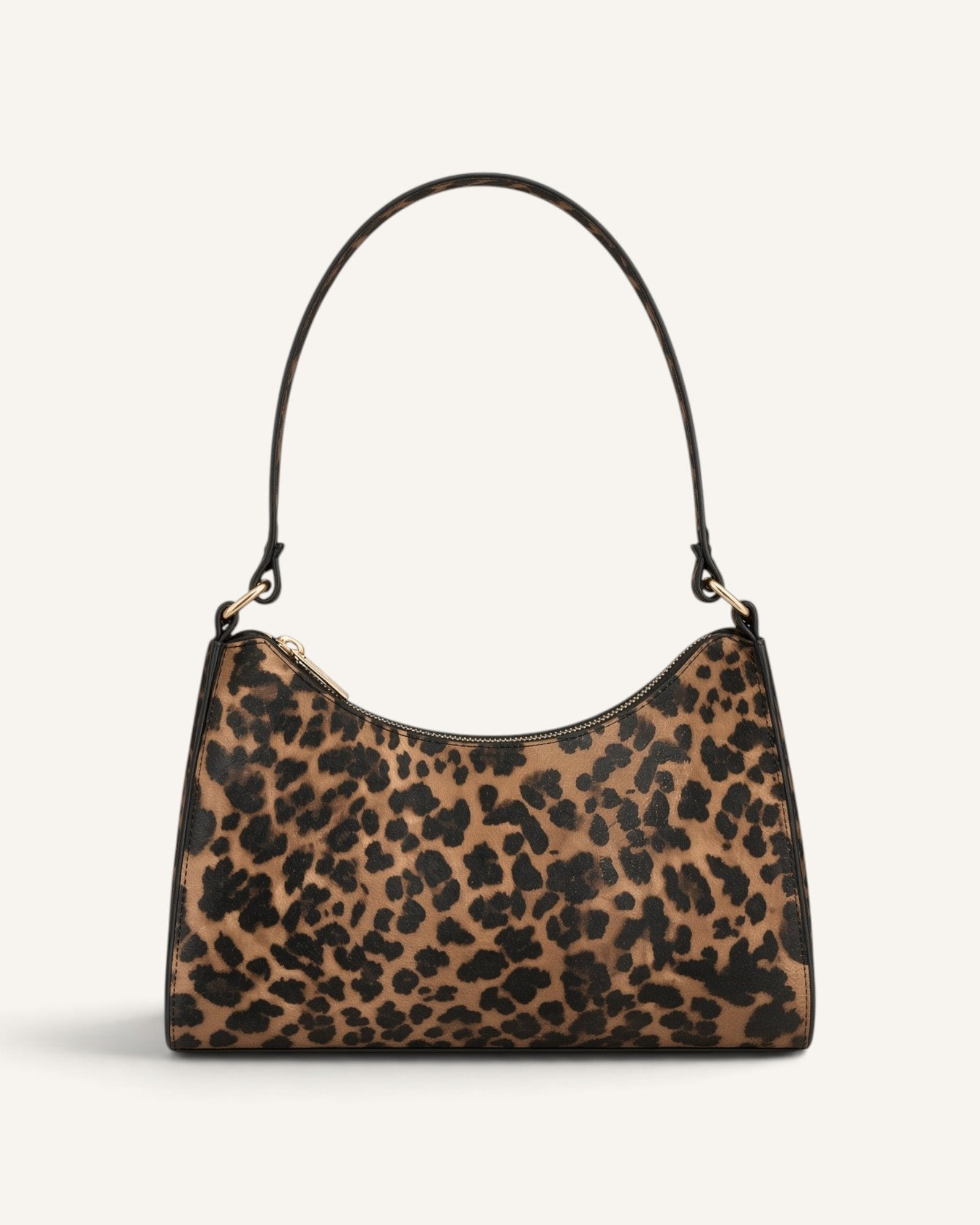 Lunéra de Paris baguette shoulder bag in a leopard print pattern with a structured silhouette and zip-top closure.