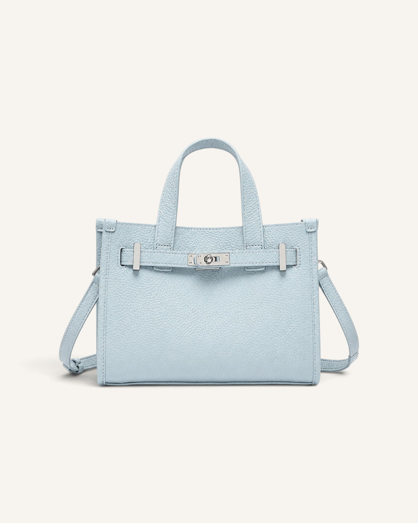 Lunéra de Paris light blue genuine leather handbag with a horizontal square shape, stitching, and silver hasp closure.