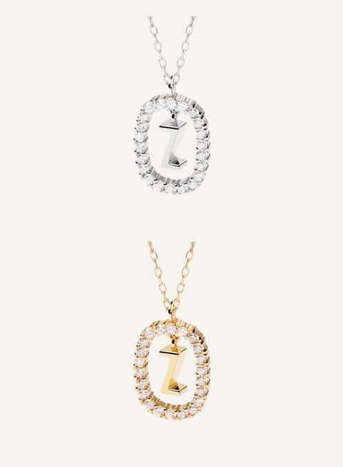 Lunéra de Paris gold and silver pavé oval initial Z pendant necklaces with delicate chains.