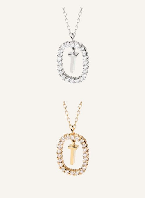 Lunéra de Paris pavé oval initial T pendant necklaces in silver and gold tones with delicate chains.