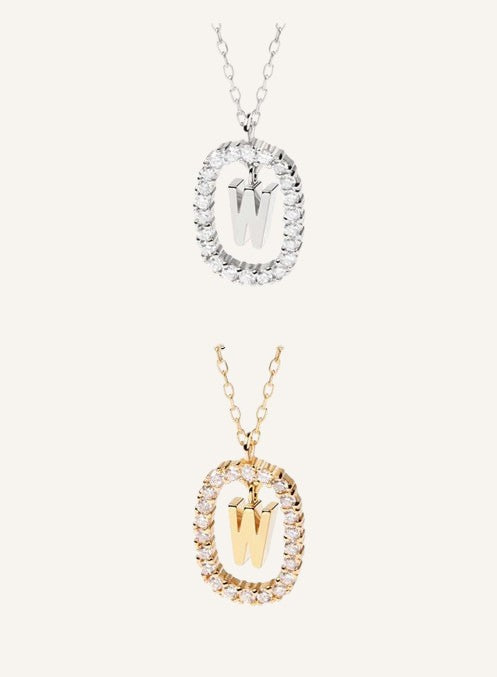Lunéra de Paris pavé oval initial W pendant necklaces in silver and gold tones with sparkling crystal accents.