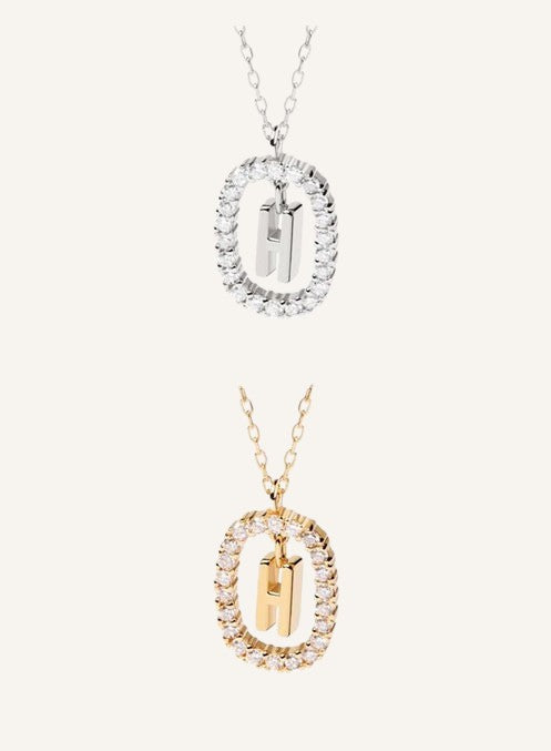 Lunéra de Paris pavé oval initial H pendant necklaces in silver and gold tones with delicate chains.