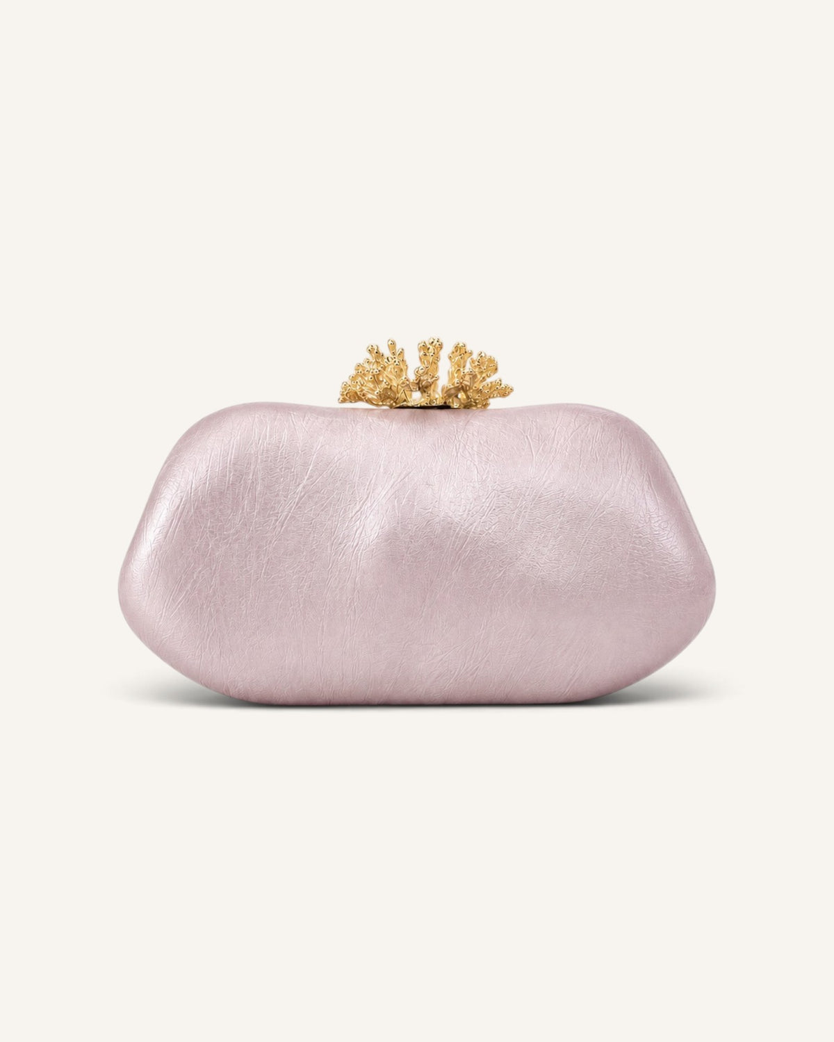 Lunéra de Paris pink oval PU leather clutch with a decorative gold coral-inspired clasp for evening events.