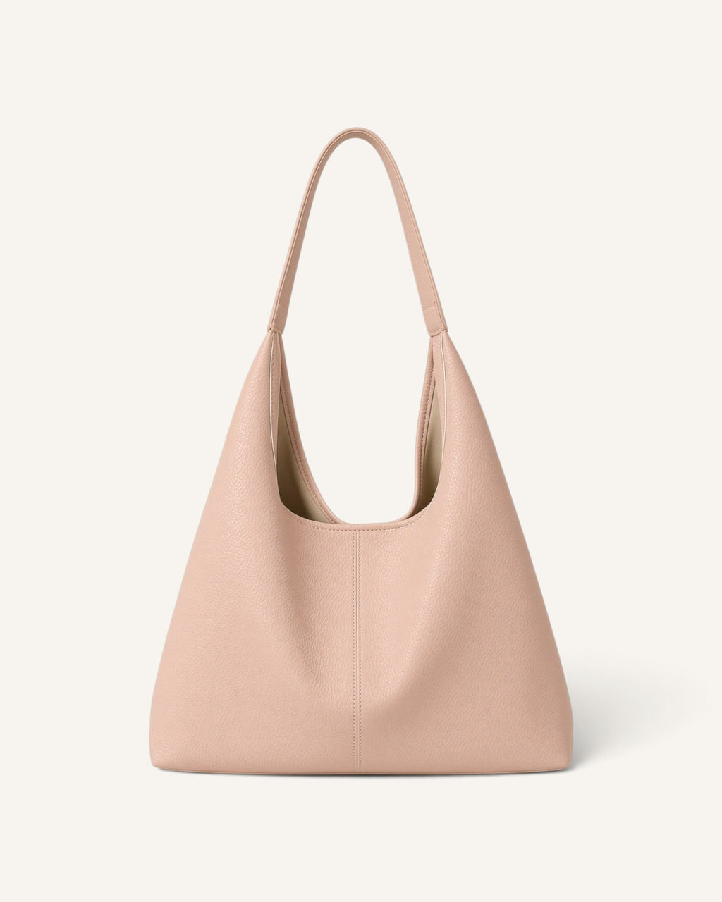 Lunéra de Paris minimalist soft pink shoulder bag with a spacious interior and comfortable strap
