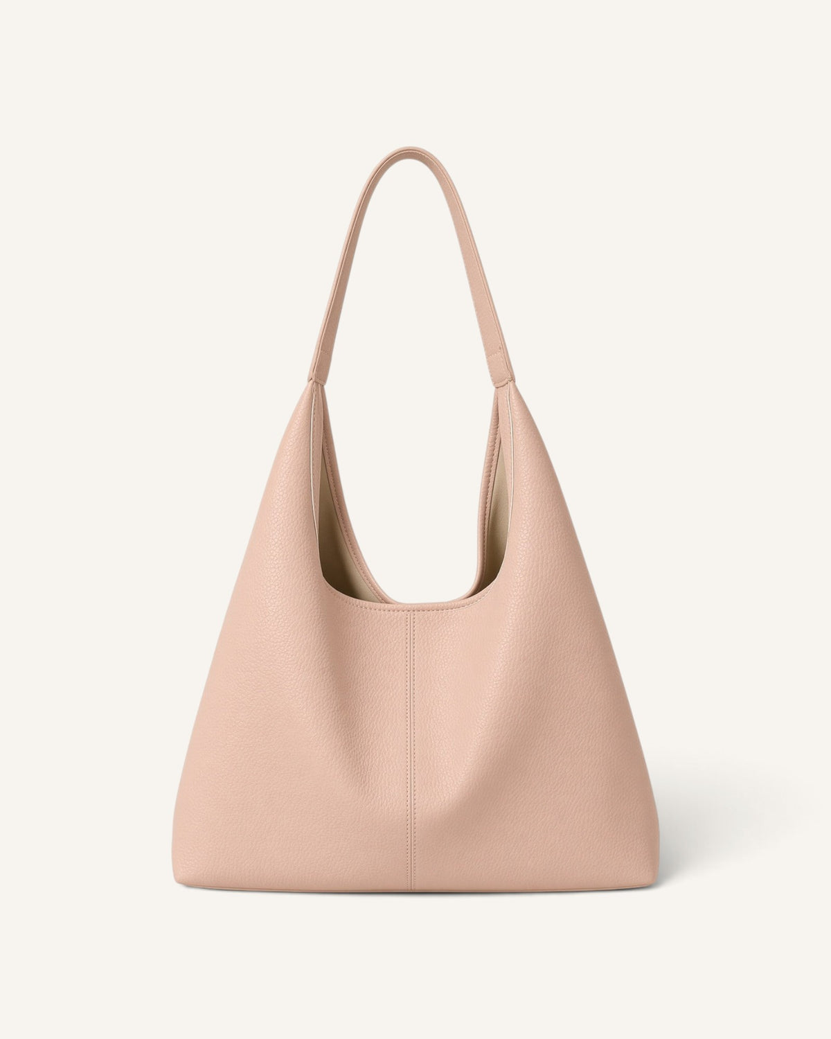 Lunéra de Paris minimalist soft pink shoulder bag with a spacious interior and comfortable strap