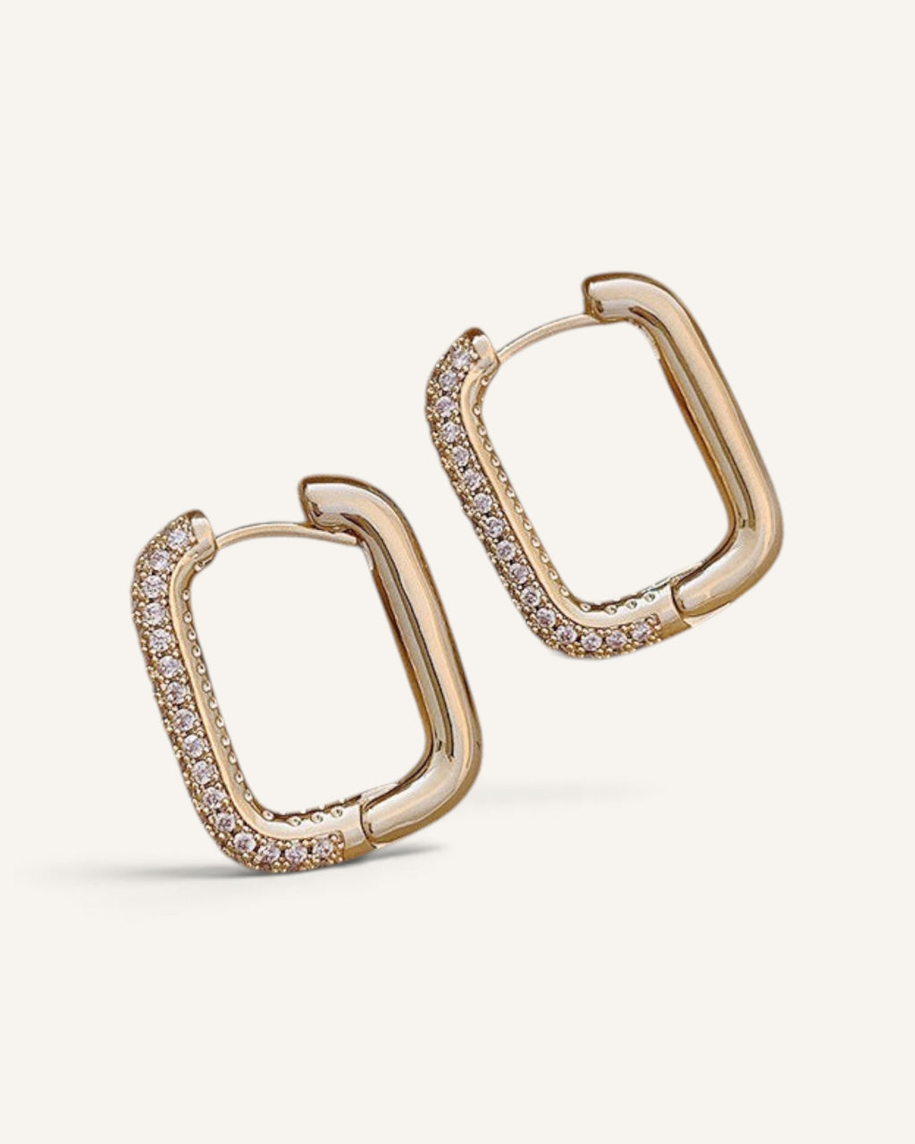 Lunéra de Paris rectangular hoop earrings in gold with pavé-style crystal detailing on one side.