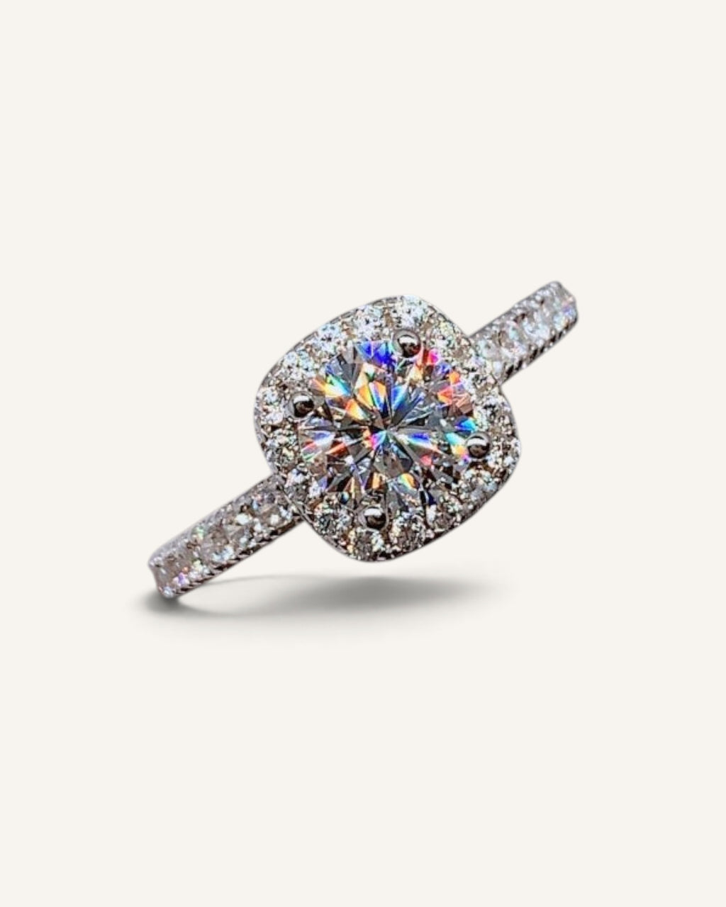 Lunéra de Paris round zircon halo solitaire ring with pavé accents on a silver band