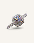 Lunéra de Paris round zircon halo solitaire ring with pavé accents on a silver band