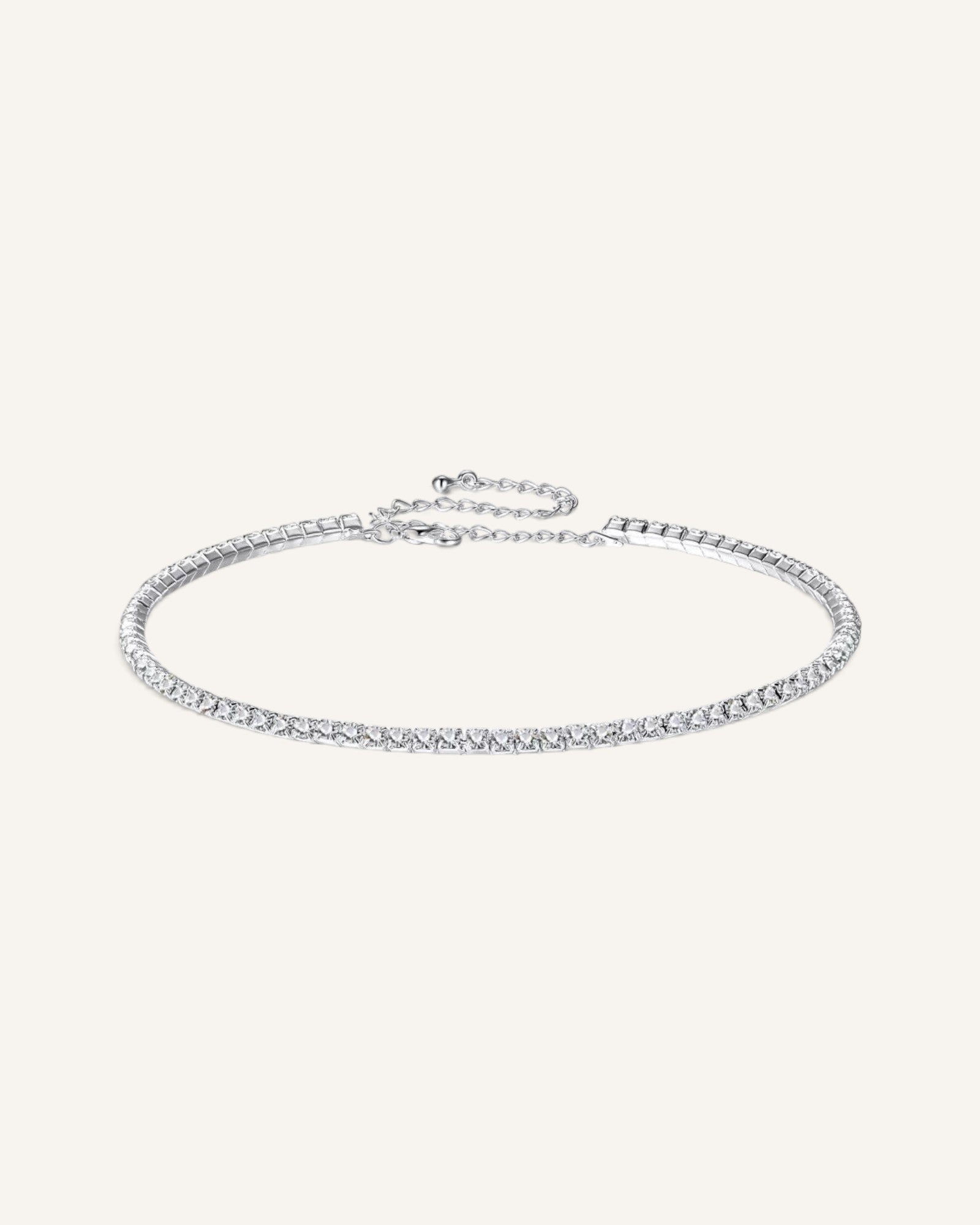 Lunéra de Paris silver tennis choker necklace with a continuous line of sparkling crystals and adjustable chain clasp