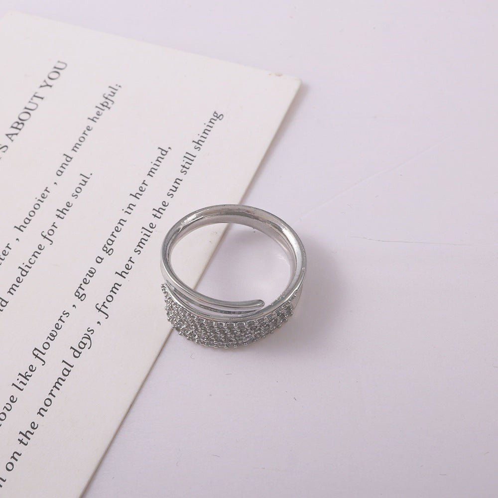 Lunéra de Paris silver pavé wrap couple ring with textured light-catching surface and open-ended design