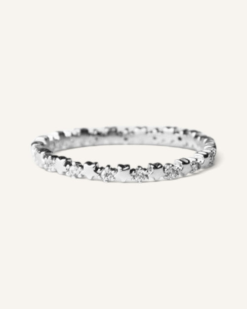 Lunéra de Paris silver-tone stackable ring featuring a delicate band with repeating star motifs and sparkling accents.