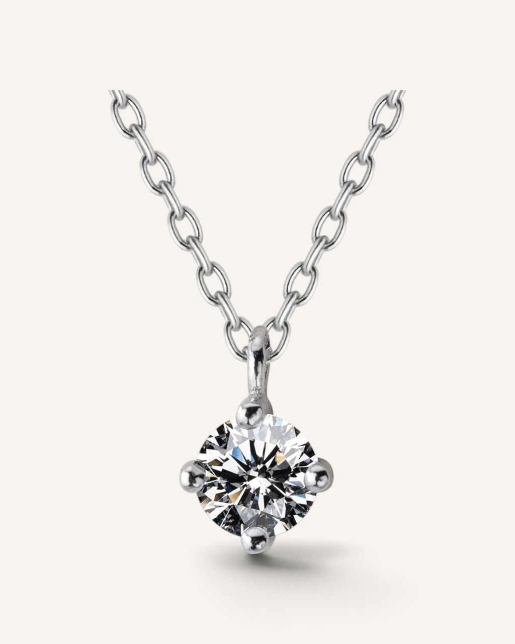 Lunéra de Paris solitaire pendant necklace featuring a round faceted stone on a delicate sterling silver chain