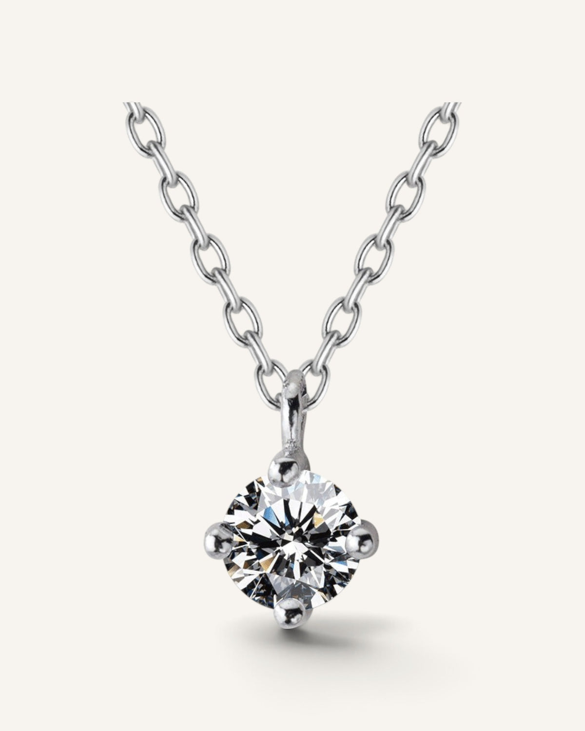 Lunéra de Paris solitaire pendant necklace featuring a round faceted stone on a delicate sterling silver chain