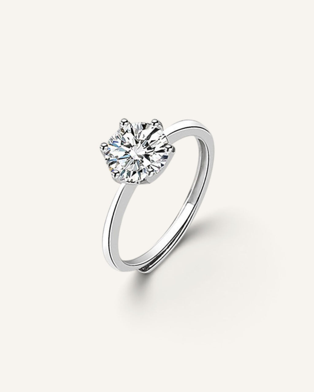 Lunéra de Paris solitaire ring featuring a round faceted zircon stone set in a polished sterling silver band.