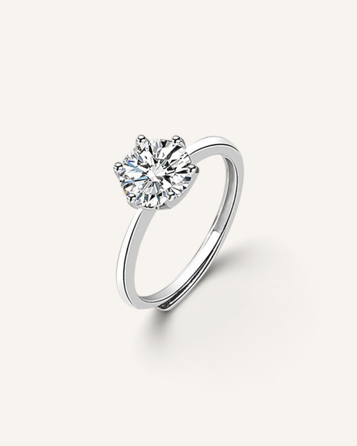 Lunéra de Paris solitaire ring featuring a round faceted zircon stone set in a polished sterling silver band.