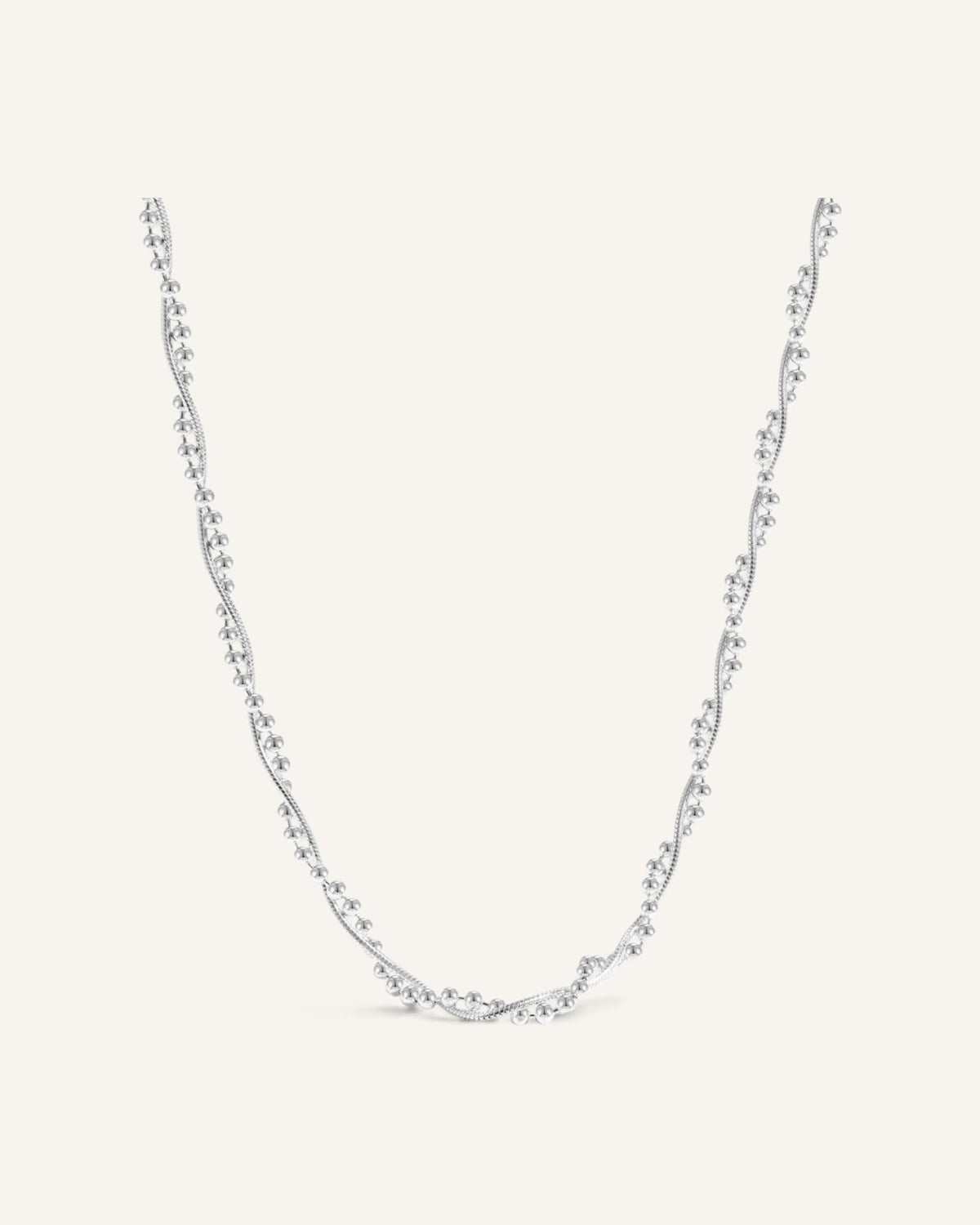Lunéra de Paris 925 sterling silver twisted chain necklace with delicate polished bead accents on a light background
