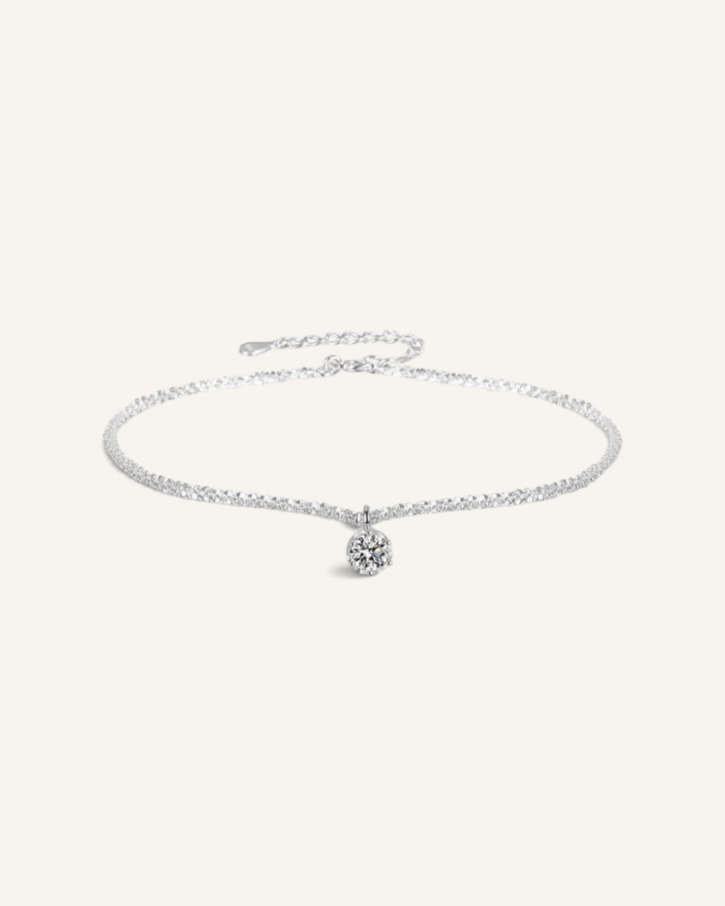 Lunéra de Paris solitaire white zircon pendant necklace with a delicate textured silver chain and minimalist design