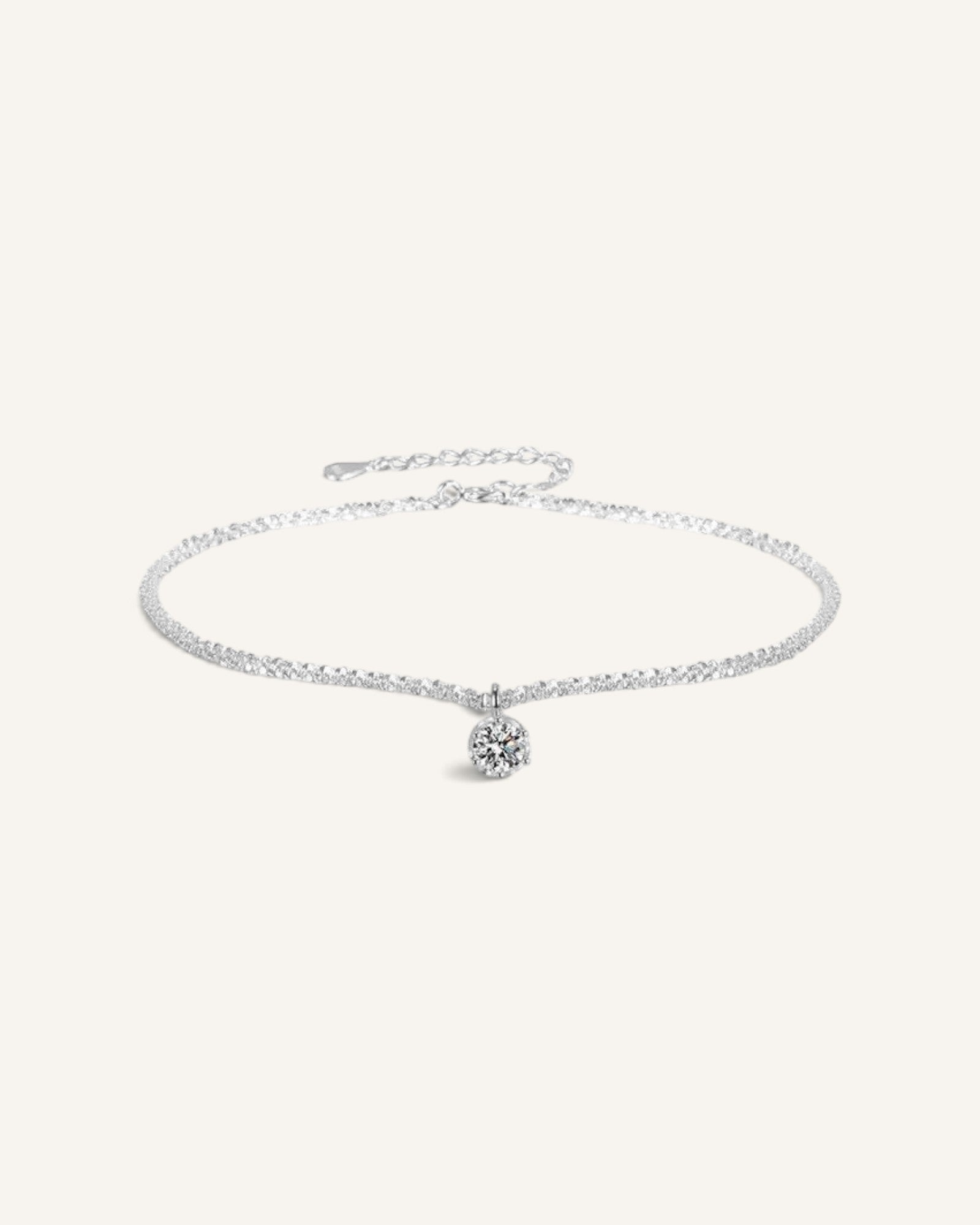 Lunéra de Paris solitaire white zircon pendant necklace with a delicate textured silver chain and minimalist design