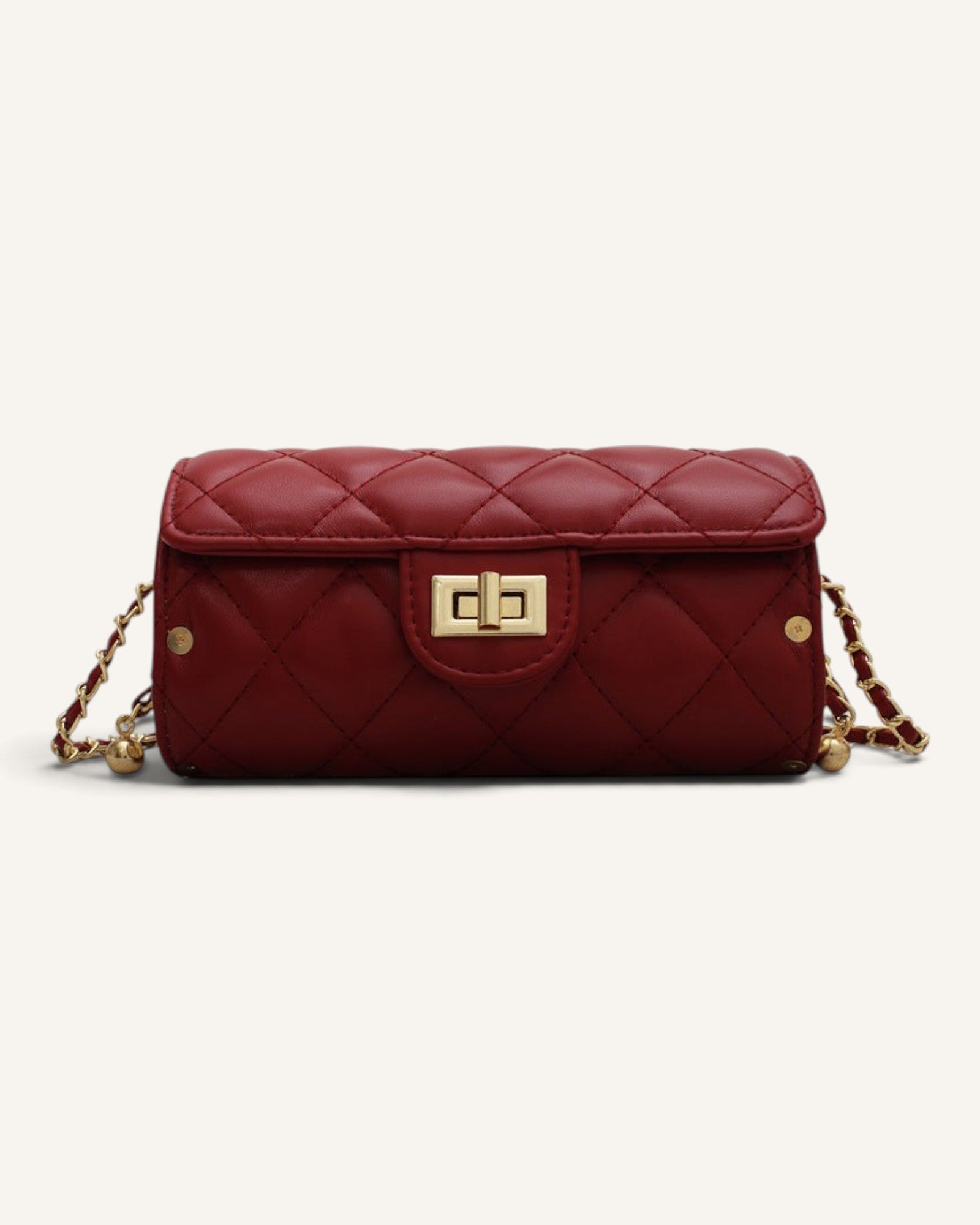 Lunéra de Paris wine red quilted cylindrical shoulder bag with gold chain strap and metal clasp