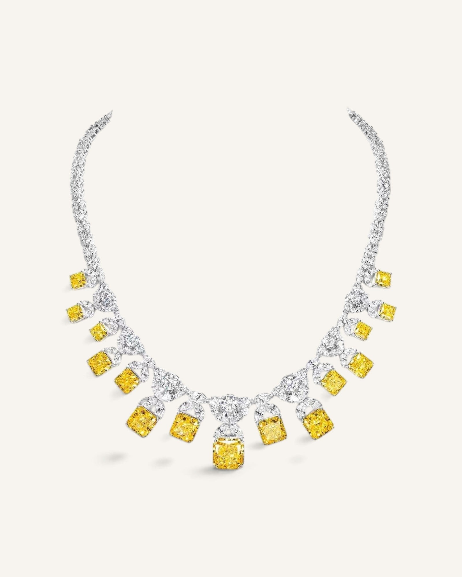Lunéra de Paris statement collar necklace with yellow cushion-cut stones and clear marquise-cut accents in silver-tone